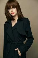 Luxurious woman black coat attractive appearance rejoicing photo