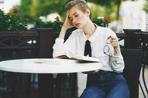 female in a summer cafe outdoors rest fun walking around town Lifestyle photo