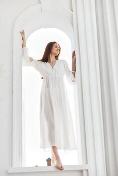 Woman in white dress posing fashion luxury photo