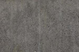 interesting industrial gray concrete background in closeup photo