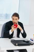 manager at the desk documents communication by phone Lifestyle photo