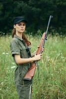 Woman With arms in hand, looking forward, lifestyle fresh air green overalls photo