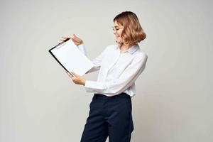 woman manager in suit documents official work photo