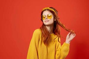 woman in yellow sweater with headband fashion modern hipster style photo