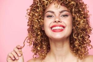 Stylish girl Wide smile with curly hair bright makeup background photo