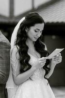 the first meeting of the bride and groom in the courtyard of the hotel photo