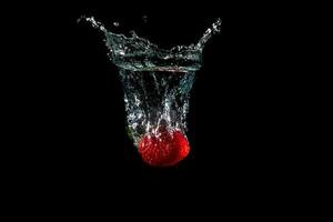 Fresh Strawberries with water splash photo