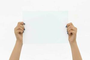 Hands Holding White Paper Sheet photo