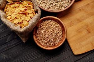 wooden tableware cereals products view from above photo