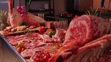 Decorative layout of meat goods on display in a butchers kitchen. video