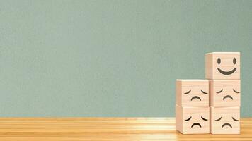 Wood cube emotion on table for abstract concept 3d rendering photo