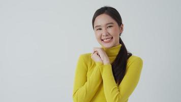 Portrait asian beautiful girl shy smile blank space isolated background. Happy woman on vacation. young female smiling success, billboard, introduction, advertisement, attractive, expression, positive video