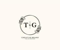 initial TG letters hand drawn feminine and floral botanical logo suitable for spa salon skin hair beauty boutique and cosmetic company. vector