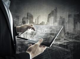 Man with tablet with digital city. Illustration photo