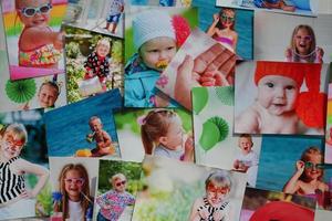 Printed photographs of children. A huge amount of printed materials. photo