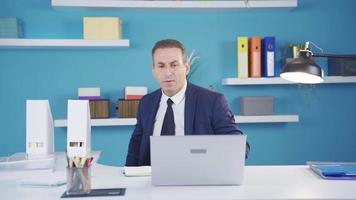 Tired company owner, manager or office worker is frustrated. The businessman, whose plans and strategy are frustrated, gets upset and angry. video