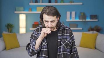 Nervous man looking at camera and biting his nails.  He's stressed. Gestures. Nervous and stressed man looking at camera and biting his nails. video