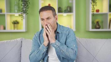 Portrait of nervous and stressed man at home. Thoughtful nervous and worried man. video