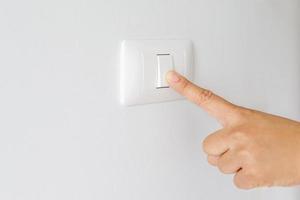 Turn off the power switch to save electricity in the house. photo