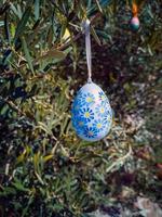 Easter Eggs on the trees. Traditional bulgarian national decoration for Easter. photo