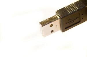 usb connector in closeup over white isolated background photo