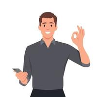 Happy young man showing smartphone and showing okay, OK or O sign. Mobile phone technology concept vector