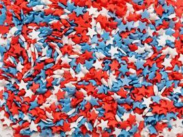 colorful star shape sprinkes decorations for fourth july texture photo