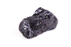 Macro mineral stone sorrel - black tourmaline on white background photo