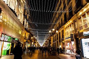 original Christmas illumination at night in the spanish city of Zaragoza photo