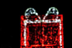 colorful Christmas background with bokeh on a black background photo
