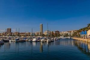 seaside landscape with yacht port in Alicante Spain on a summer warm sunny day photo