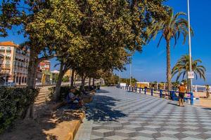 urban landscape with promenade resort in spain Alicante on a sunny day photo