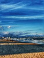 calm seaside landscape of san juan beach in alicante spain on a sunny day photo