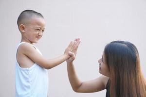 Mother and child playing happily photo