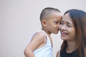 Mother and child playing happily photo