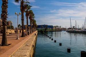 seaside landscape with yacht port in Alicante Spain on a summer warm sunny day photo