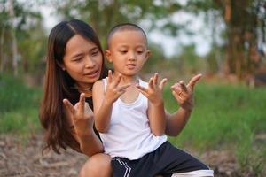 Mother and child playing happily photo