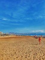 calm seaside landscape of san juan beach in alicante spain on a sunny day photo