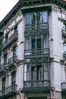 interesting townhouse with original windows in the Spanish city of Zaragoza in the old town photo