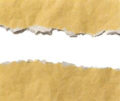 torn piece of paper on a white background. rough paper texture. . photo