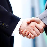 Two business people shaking hands. . photo