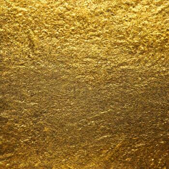 gold texture background. close up of shiny surface of gold. golden smooth material. gold leaf. . photo