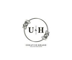 initial UH letters hand drawn feminine and floral botanical logo suitable for spa salon skin hair beauty boutique and cosmetic company. vector