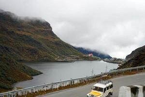 Lake named Tsomgo or Changu in Between Mountain range at East  Sikkim photo