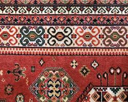 bright colourfulpattern persian carpet photo