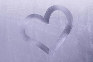 valentine drawn on a frozen window photo