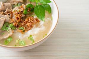 Pho Bo vietnamese soup with pork and rice noodles photo