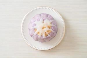 taro bun with white sugar cream and nut photo