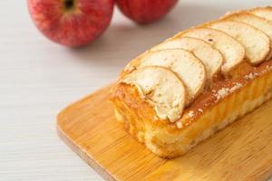 apple loaf crumbled on wood board photo