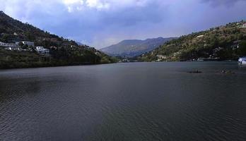 View of nainital lake on a clear cloud, and mountain photo